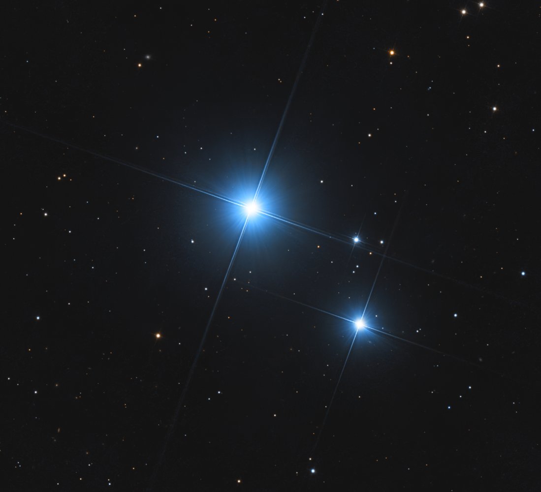 Processed photograph of Mizar and Alcor; not an eyepiece view.