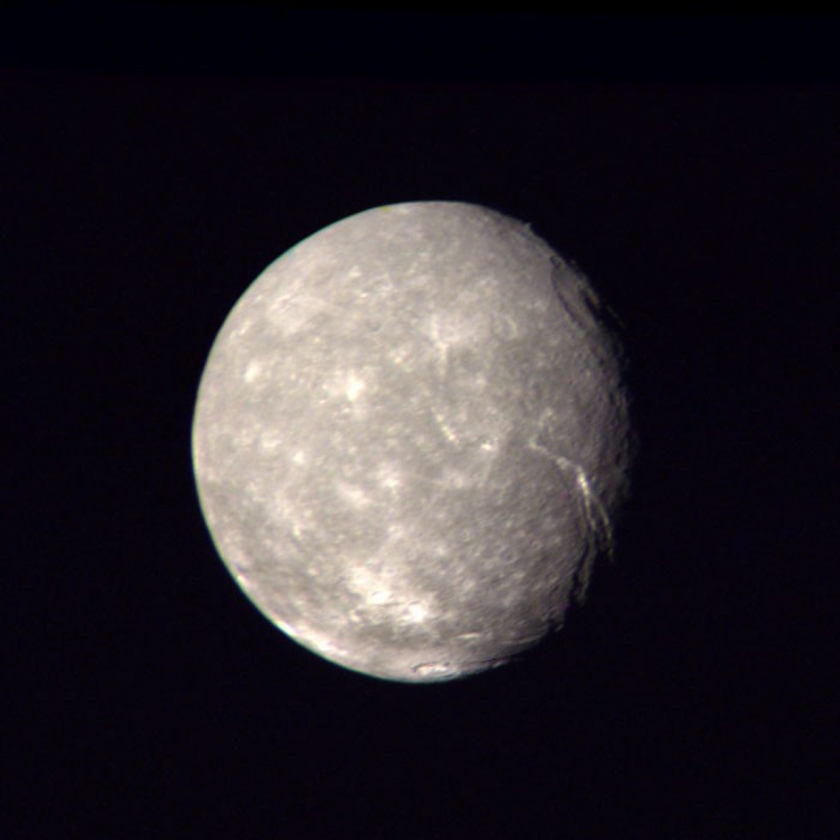 Titania in a Voyager 2 color composite. NASA/JPL.