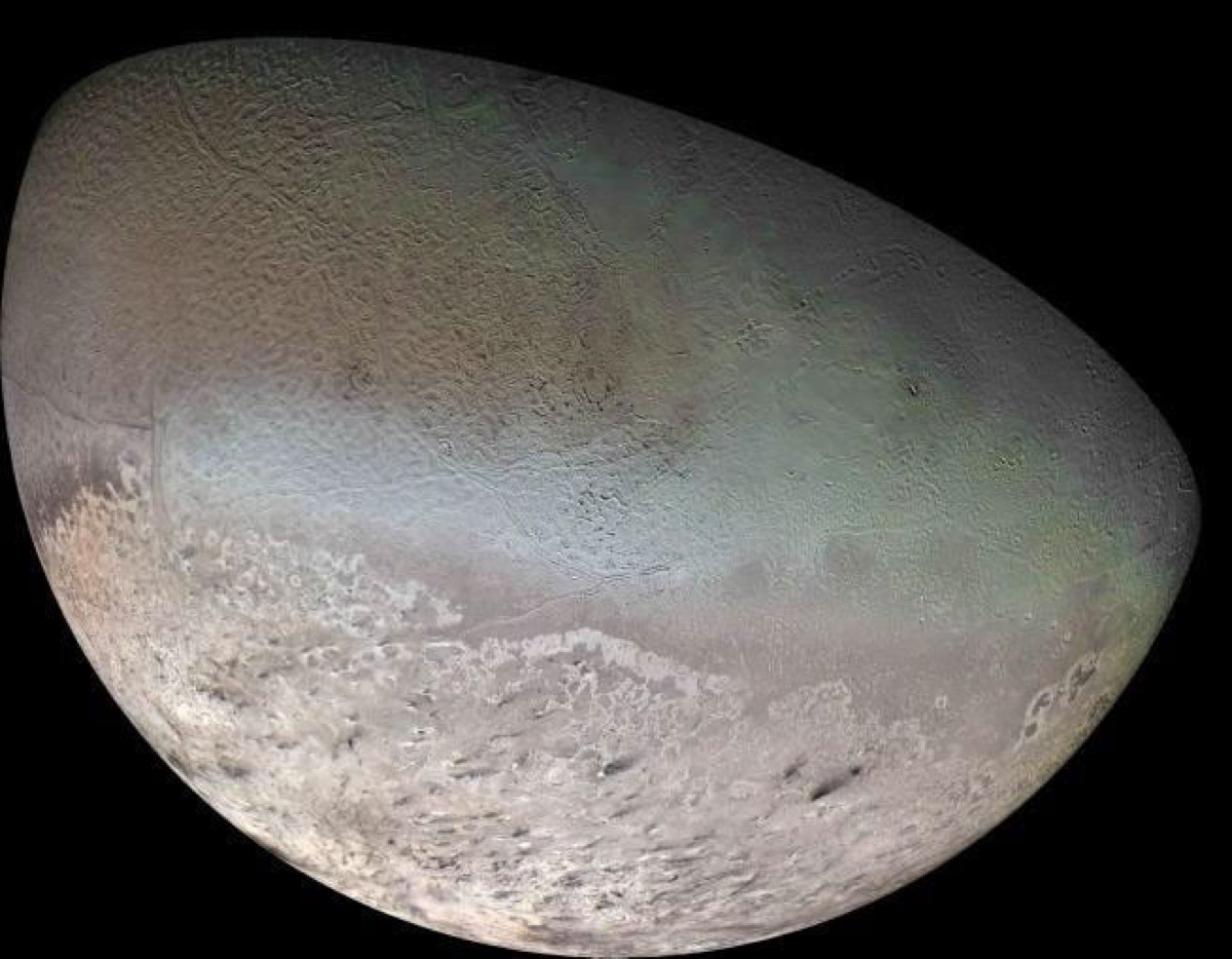 Triton in a Voyager 2 color mosaic. NASA/JPL/USGS.