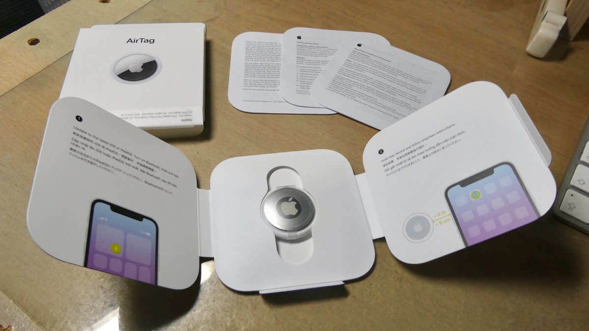 An AirTag; illustrative example of an item tracker.